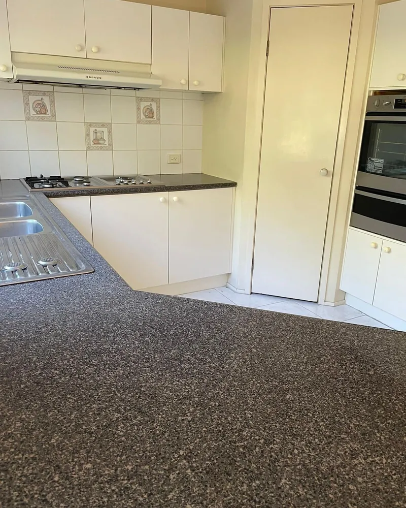 Kitchen bench and cupboards after end of lease clean